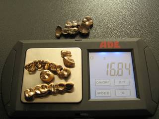 16.84 grams of dental scrap gold on the scale