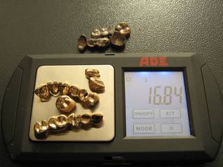 16.84 grams of dental scrap gold on the scale