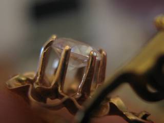 Real diamond mounted on gold jewelry