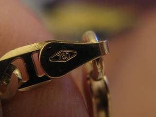 Hallmarks 585 and 750 on gold jewelry and diamond recognition