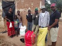 Laurence at Upendo orphanage, delivery of clothes and shoes