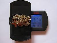 67.18 grams of gold jewelry bought and sold in 2010 by GOLDIVANTI LP