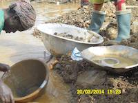 Miners panning for gold in Ghana